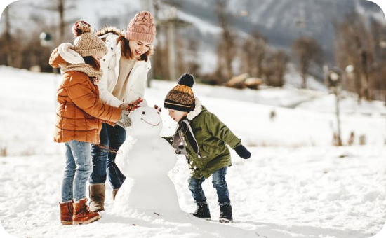family building a snow man
