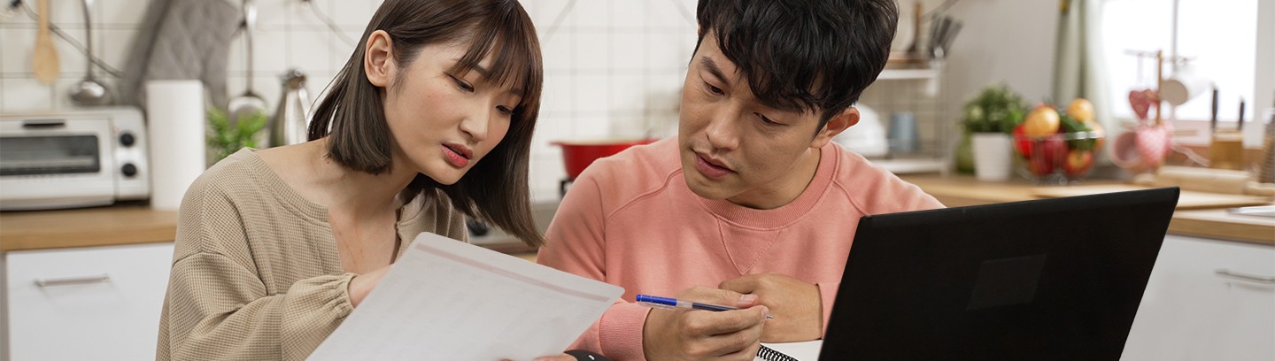 Couple looking at their bill 